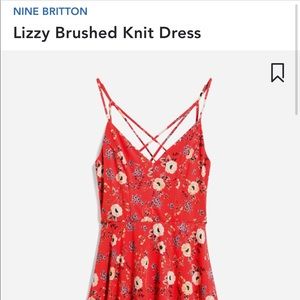 Red floral mini dress with cute straps. Never worn. True to size.